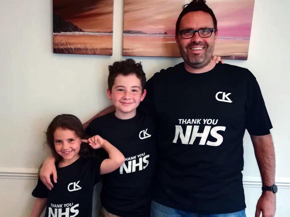 Chelston & Kingskerswell cricketer Matt Rossin, with son Seb and daughter Sophia, modelling one of the shirts sold by the club to raise money for NHS charities