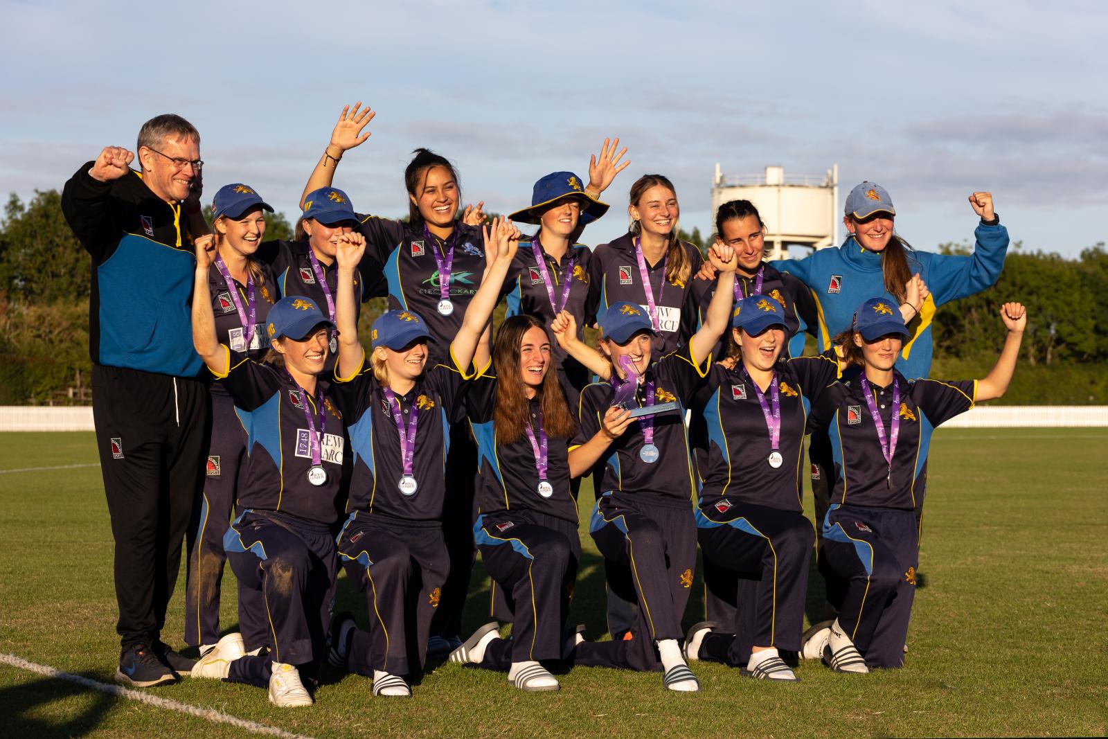Devon Cricket Under 18 Girls celebrate with the trophy.<br>credit: Mark Lockett Photography