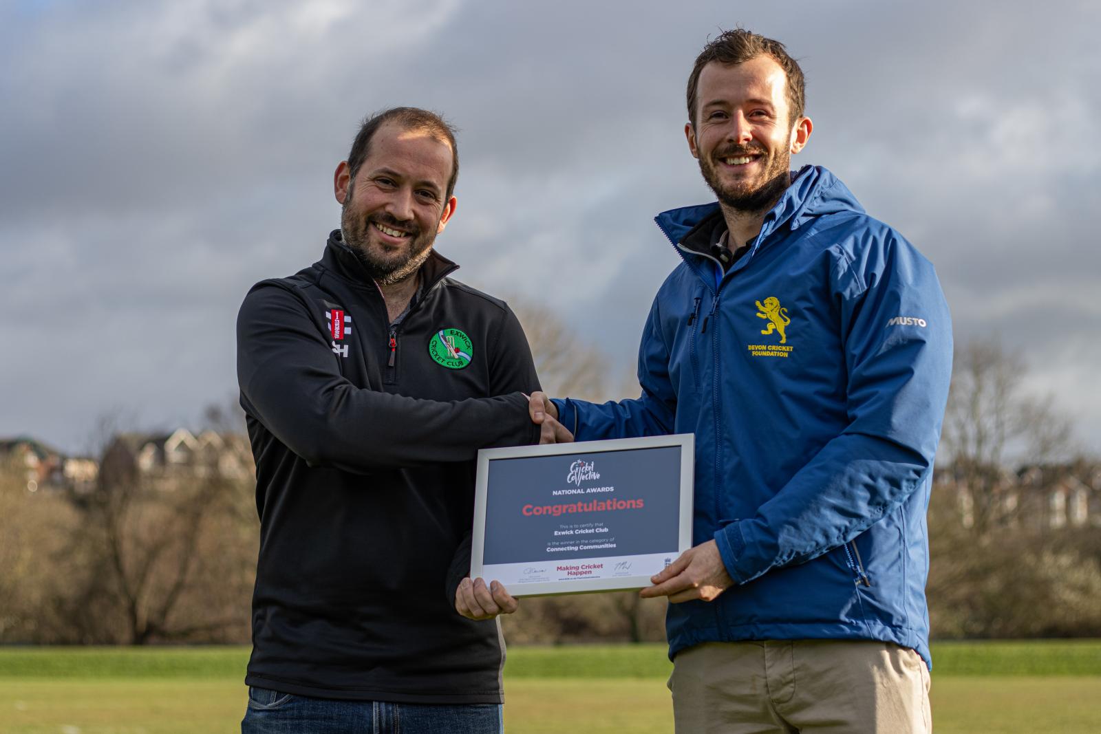 Devon Cricket Foundation's Alex Jopling presents Simon Hukku with the National Connecting Communities Cricket Collective Award.