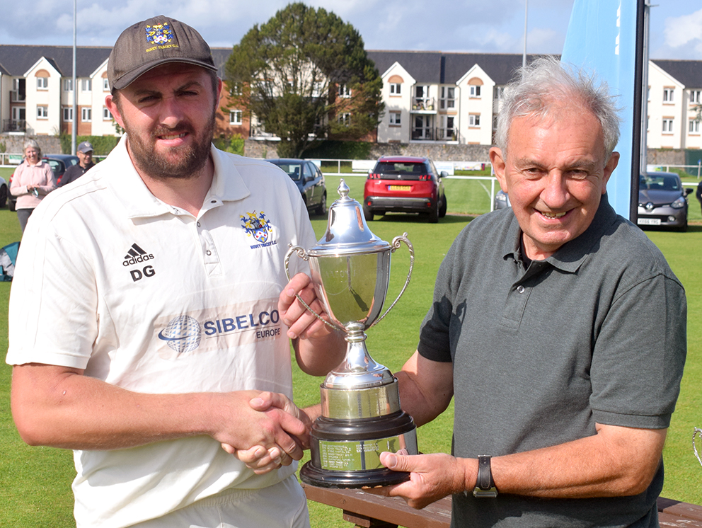 Flashback! Bovey Tracey skipper Dan Green collecting the Aaron Printers Cup after the 2021 final – will Green win it again this Sunday?<br>credit: Conrad Sutcliffe - no re-use without copyright owner's consente